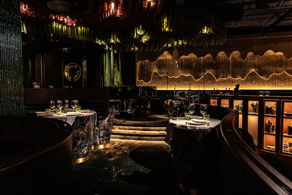 Amazonico London restaurant interior featuring bespoke architectural LED lighting design