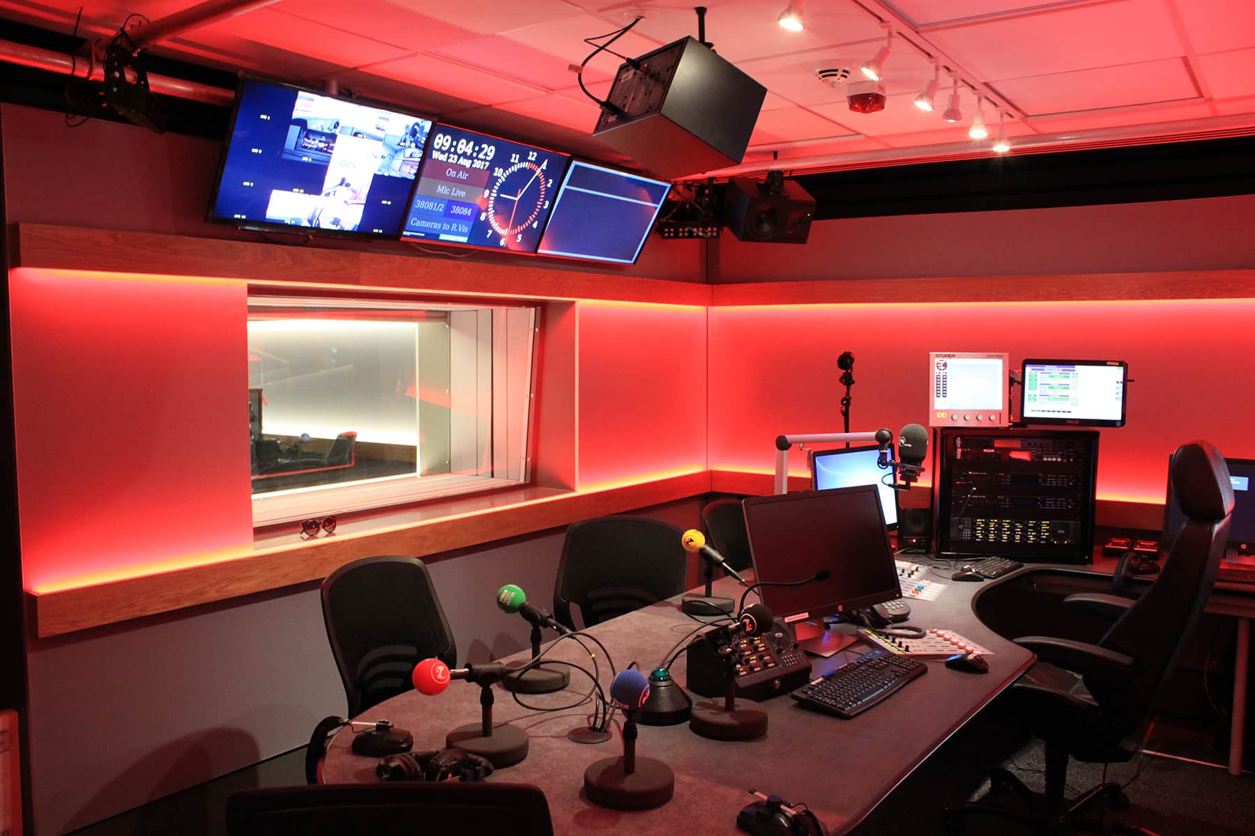 BBC Belfast radio studio interior with colour changing LED lighting integrated along walls and broadcast workspace