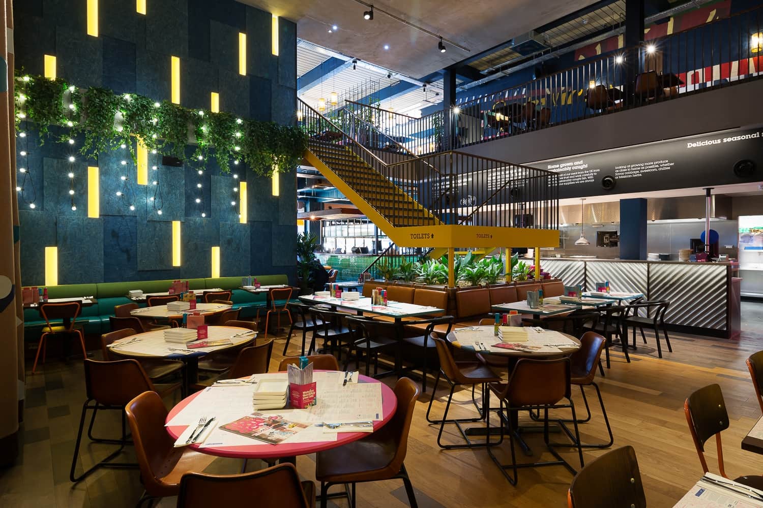 Wahaca restaurant interior featuring creative LED lighting design enhancing modern dining ambience